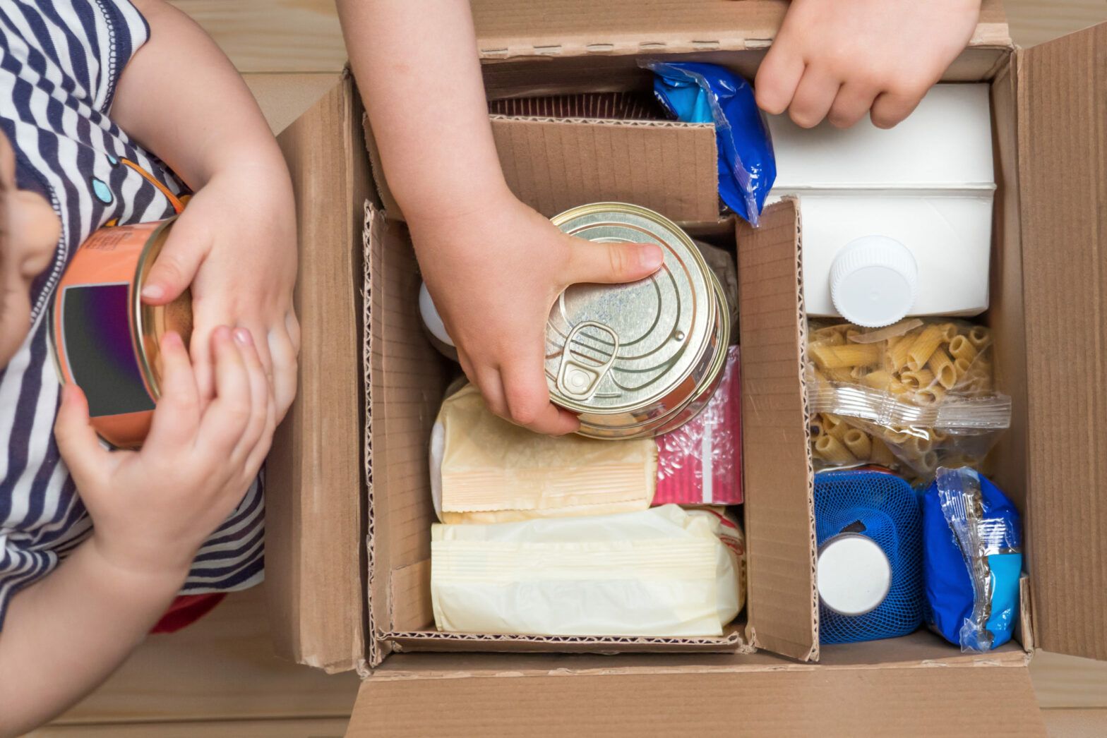 Investment manager coalition urge Compass to take action over inadequate food parcels