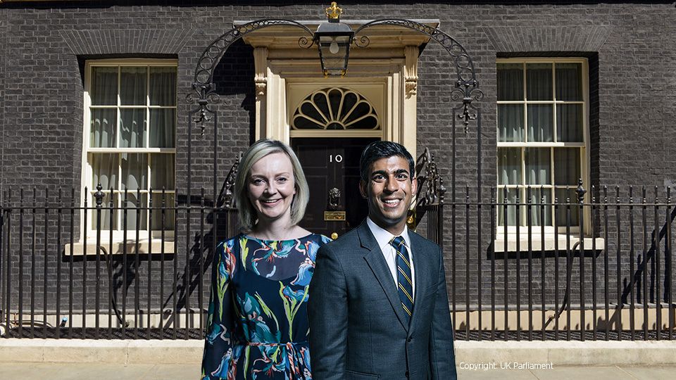 Tory leadership candidates Liz Truss and Rishi Sunak stand outside No 10 Downing Street in London