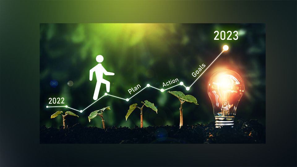 New Year 2023 with plan, action, innovation and goals. Growing plan of successful business in 2023 year and a figure climbs the ladder of success