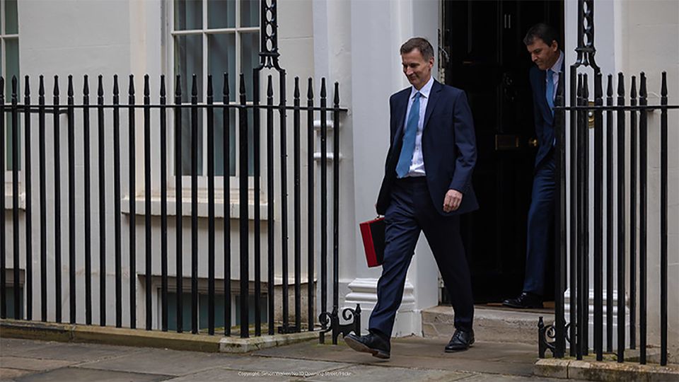 The Chancellor of the Exchequer Jeremy Hunt, accompanied by his ministerial team and watched by his wife and children, leaves 11 Downing Street on his way to deliver the budget. Picture by Simon Walker / No 10 Downing Street