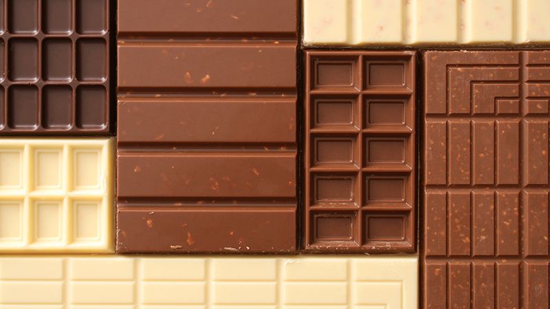 Top view of regular assortment of milk and white chocolate bars