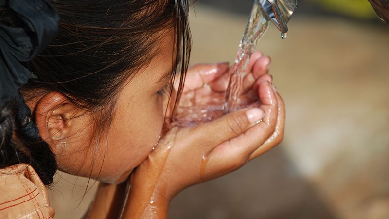 Rural girl Drinking water...