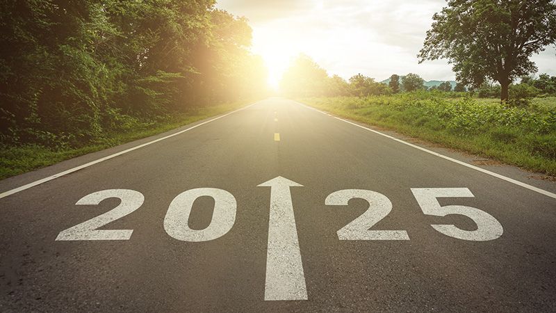 New year 2025 or straightforward concept. Text 2025 written on the road in the middle of asphalt road at sunset. Concept of planning , challenge, business strategy, opportunity ,hope, new life change.