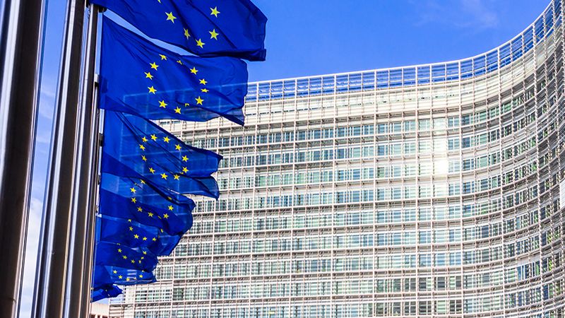 Row of EU Flags in front of the European Union Commission building in Brussels